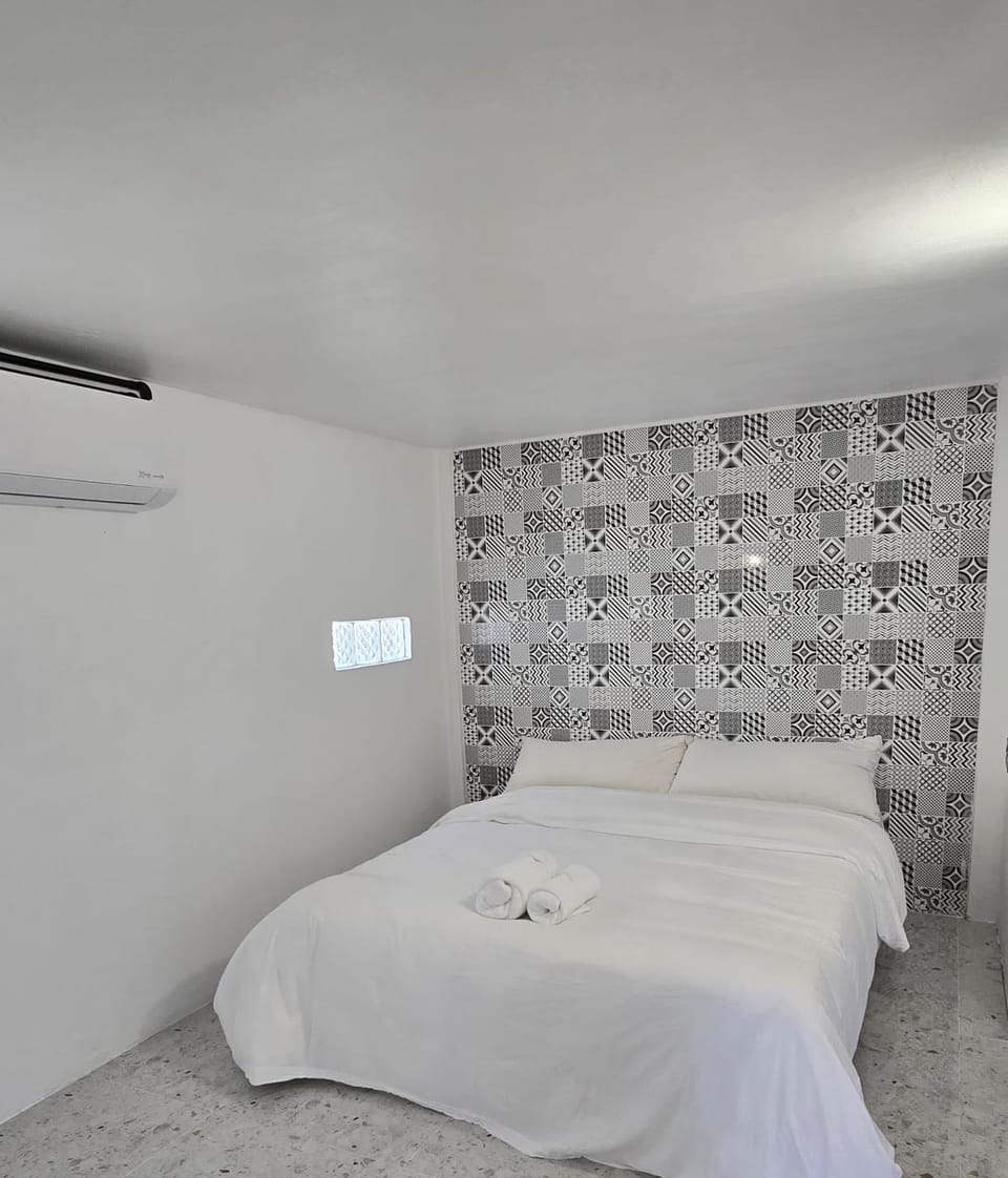 Bed, Photo of the whole room, Bedroom, towels, air conditioner