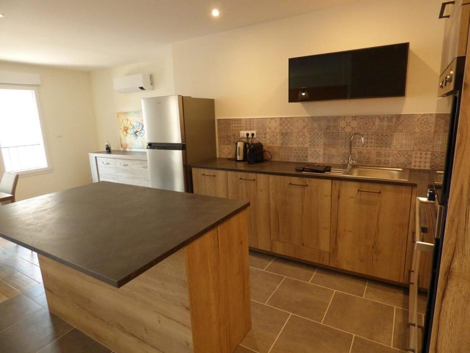 Kitchen or kitchenette, dishwasher, oven, stove