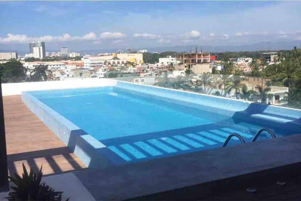 15 Minute Walk to Beach KING Bed Rooftop Pool Apartment in Puerto Vallarta