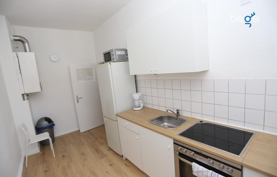 Kitchen or kitchenette, oven, stove