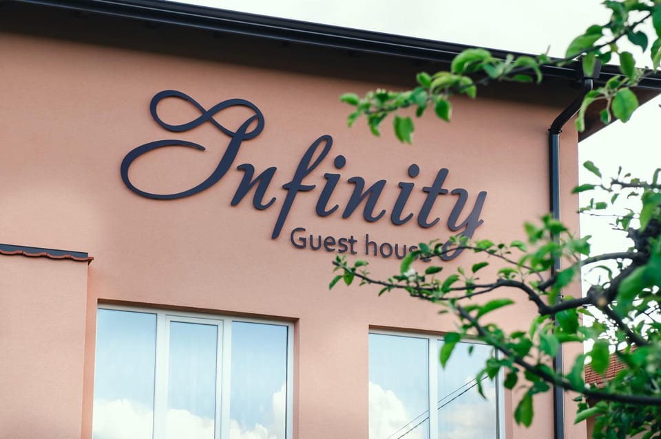 Day, Property logo or sign, Logo/Certificate/Sign, Text overlay