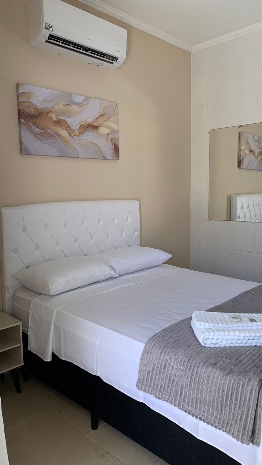 Bed, air conditioner