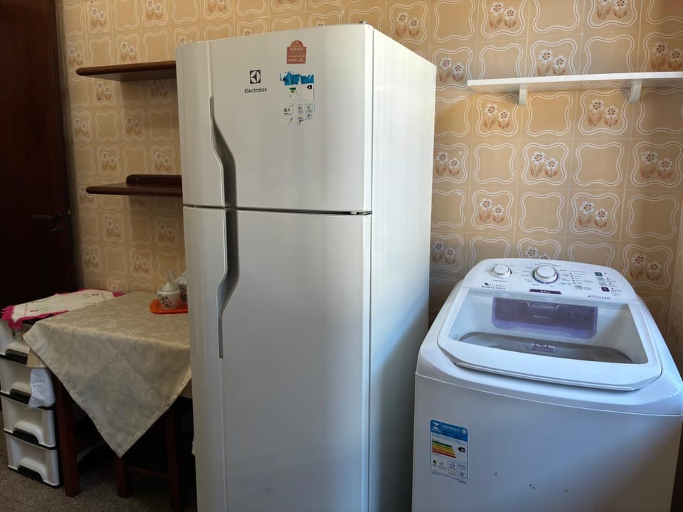Kitchen or kitchenette, washing machine