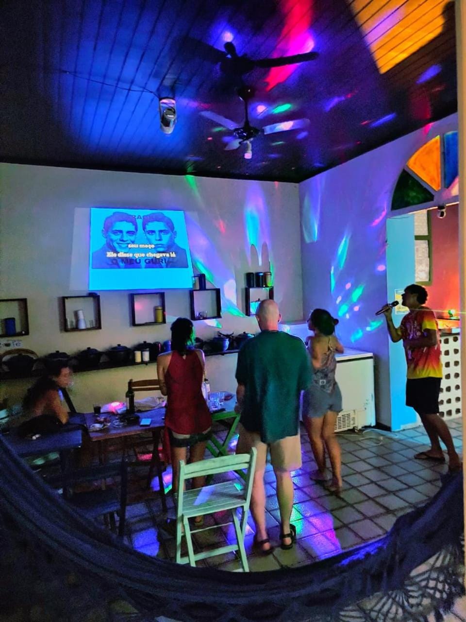 Property building, Communal lounge/ TV room, People, TV and multimedia, Evening entertainment, group of guests