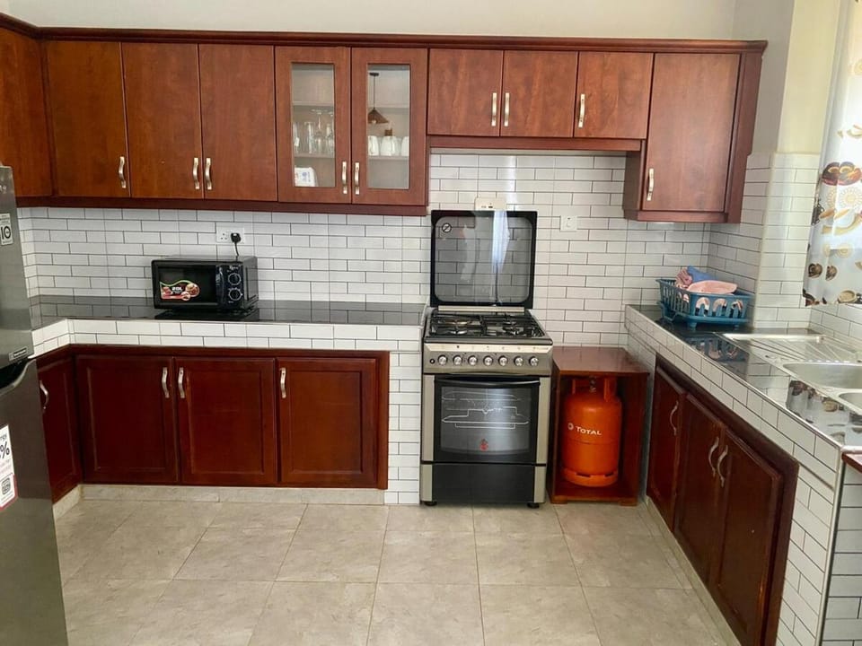 Kitchen or kitchenette, oven, stove