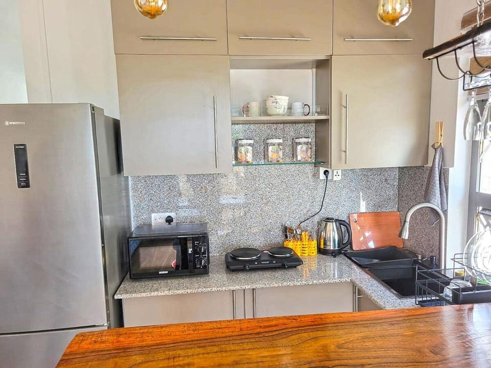 Kitchen or kitchenette, stove, toaster