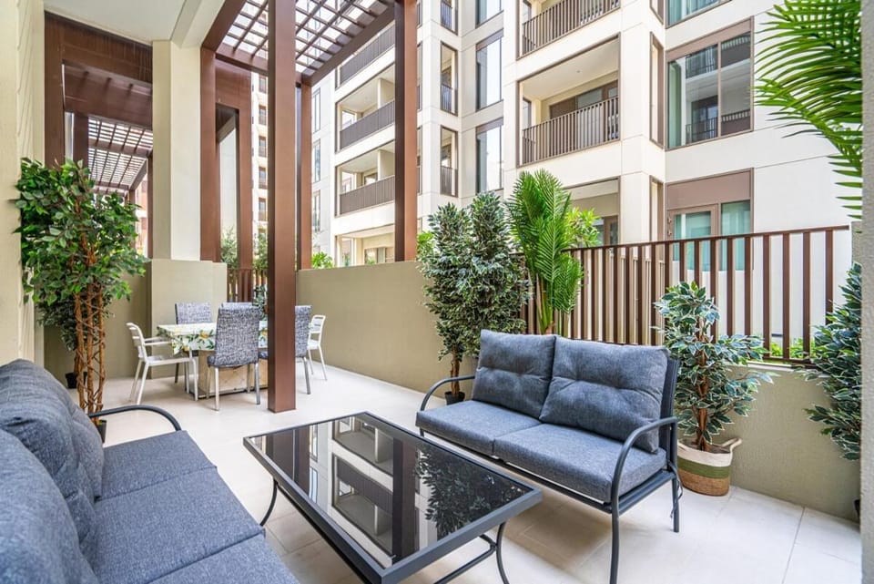 Charming 1BR with Airy Terrace, Pool and Gym Access Apartment in Dubai