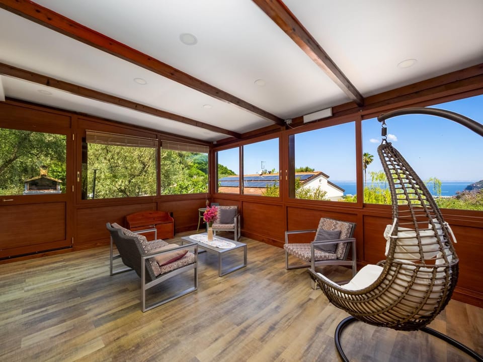 Patio, Day, View (from property/room), Balcony/Terrace, Living room, Seating area, Sea view