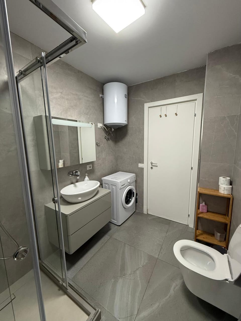 Shower, Toilet, Bathroom, towels, washing machine, dryer