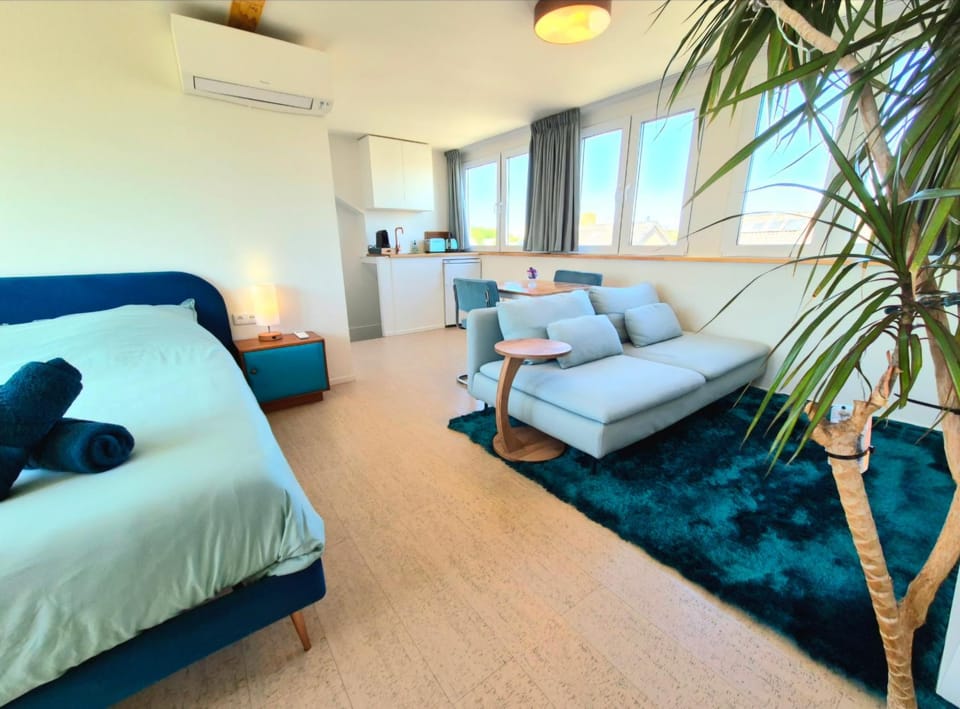 Bed, Living room, Seating area, Bedroom