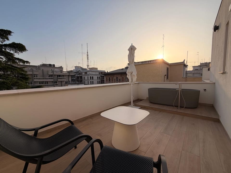 Property building, Patio, Communal lounge/ TV room, Day, View (from property/room), Balcony/Terrace, Living room, Seating area, Evening entertainment, Sunrise, Sunset