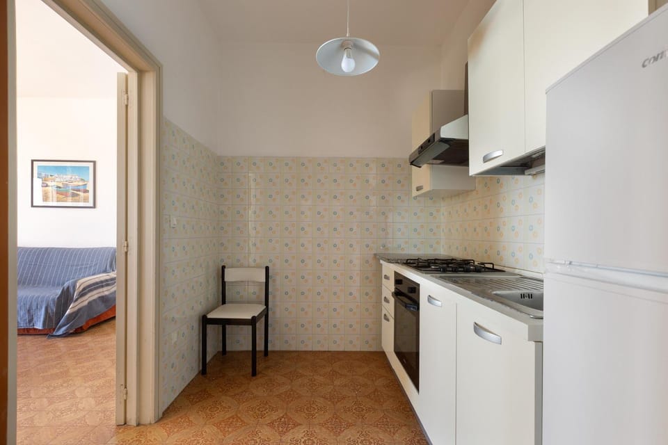 Kitchen or kitchenette, oven, stove
