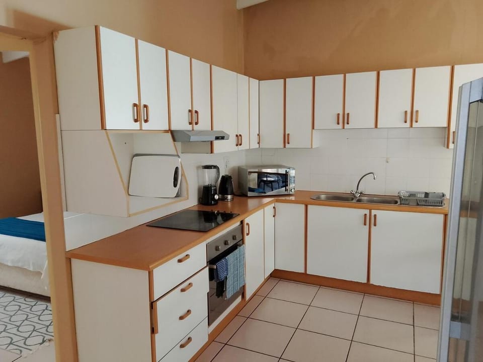 Kitchen or kitchenette, oven
