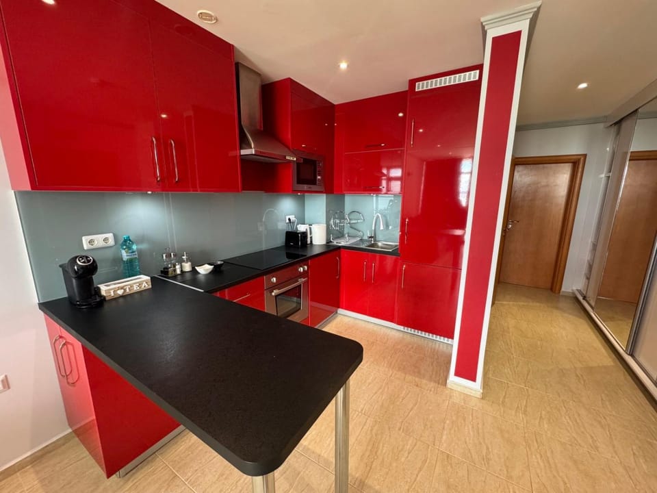 Kitchen or kitchenette, oven, stove