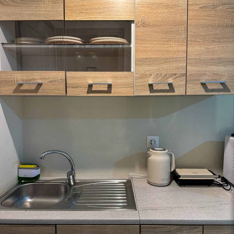 Kitchen or kitchenette, stove