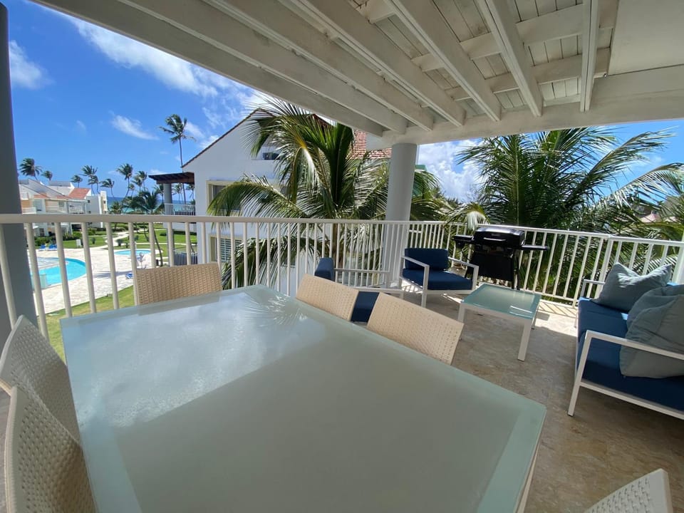 Patio, Day, View (from property/room), Balcony/Terrace, Living room, Seating area, Dining area, Pool view, Swimming pool, sunbed