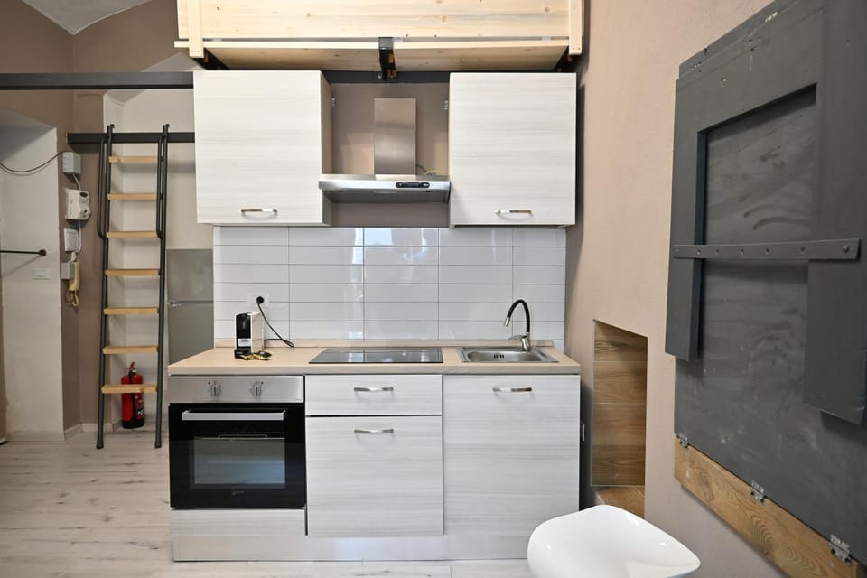 Kitchen or kitchenette, stove