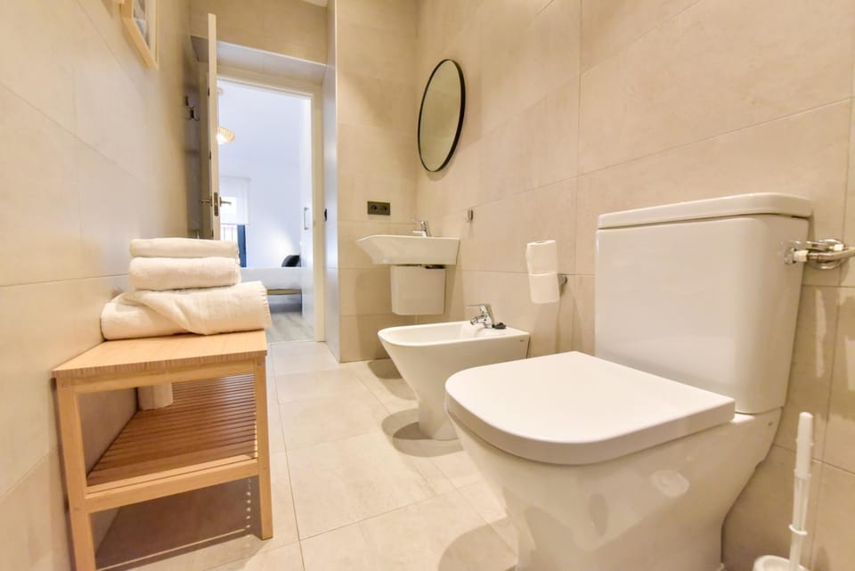 Bathroom, bidet, towels
