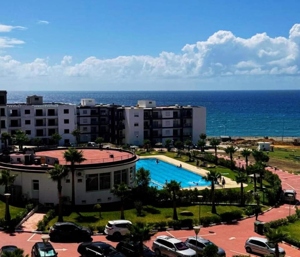 Property building, Restaurant/places to eat, Bird's eye view, View (from property/room), View (from property/room), Beach, On site, Swimming pool