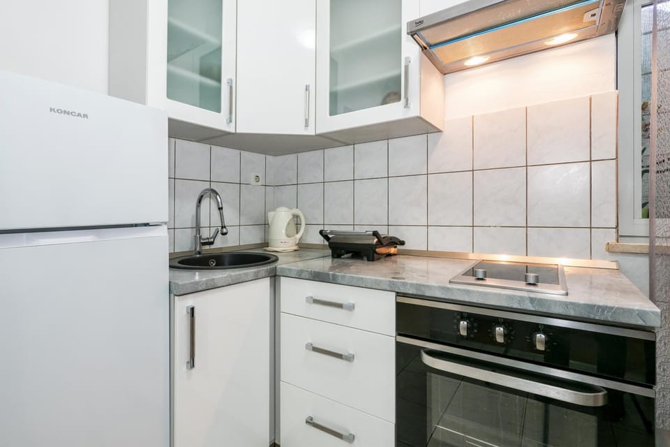 Kitchen or kitchenette, stove