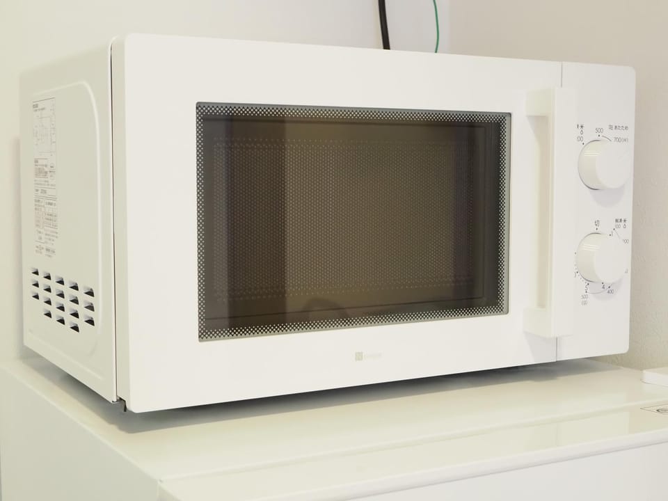 Kitchen or kitchenette, microwave
