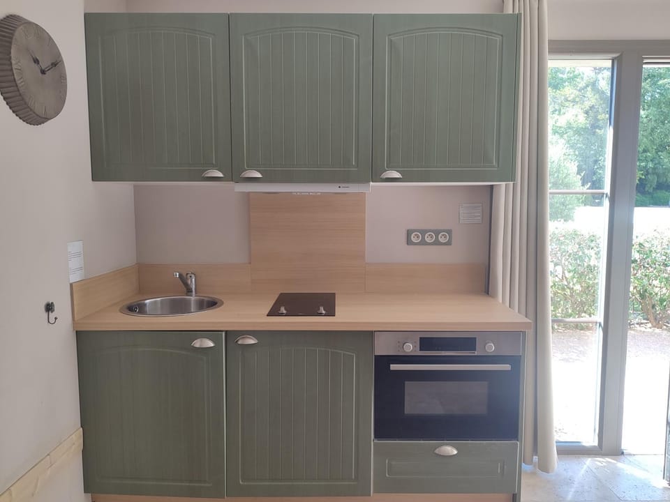 Kitchen or kitchenette, stove