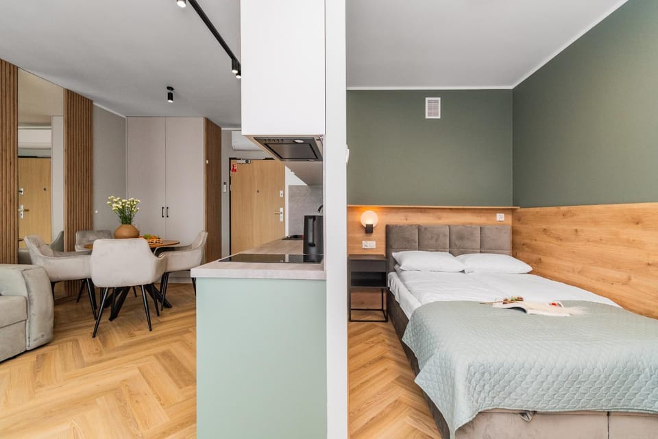Bed, Kitchen or kitchenette, Seating area, air conditioner
