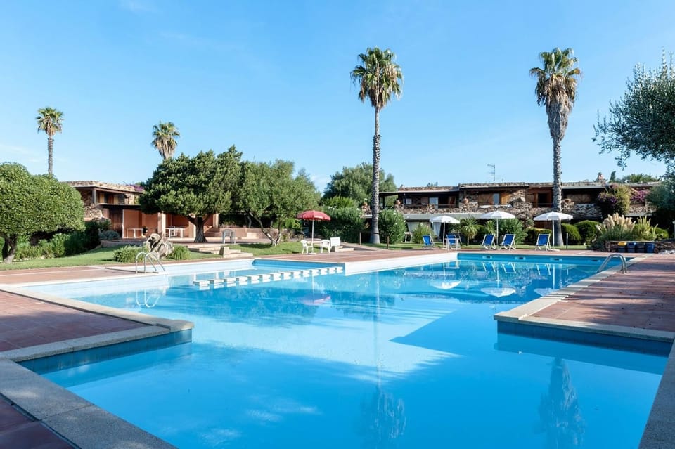 Property building, Living room, Swimming pool