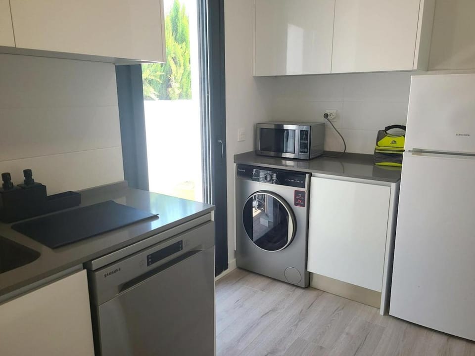 Kitchen or kitchenette, dishwasher, washing machine
