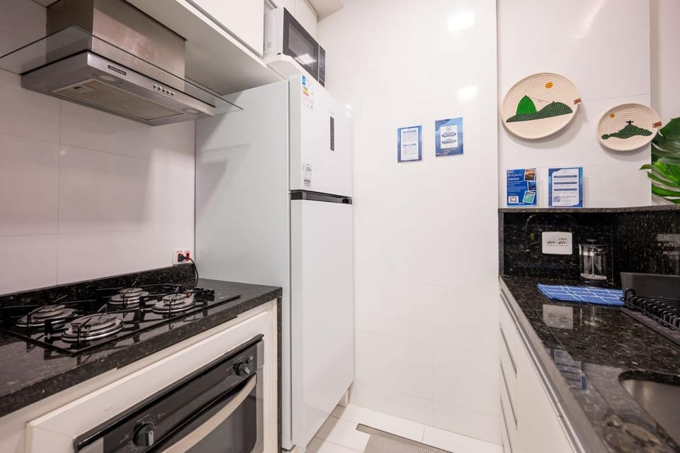 Kitchen or kitchenette, oven, stove