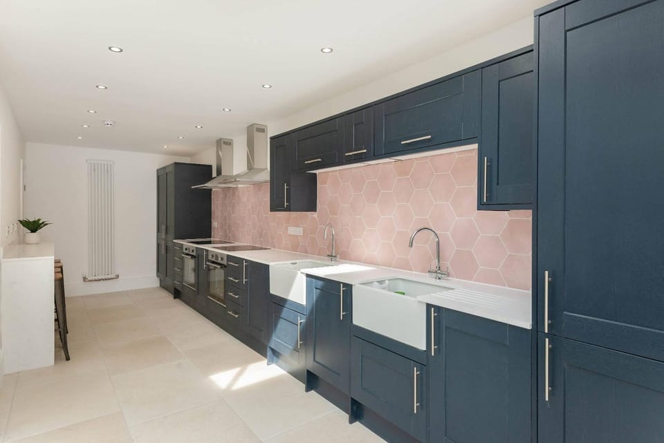 Kitchen or kitchenette, dishwasher, oven, stove
