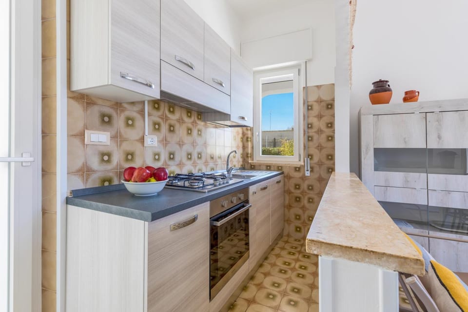 Kitchen or kitchenette, stove