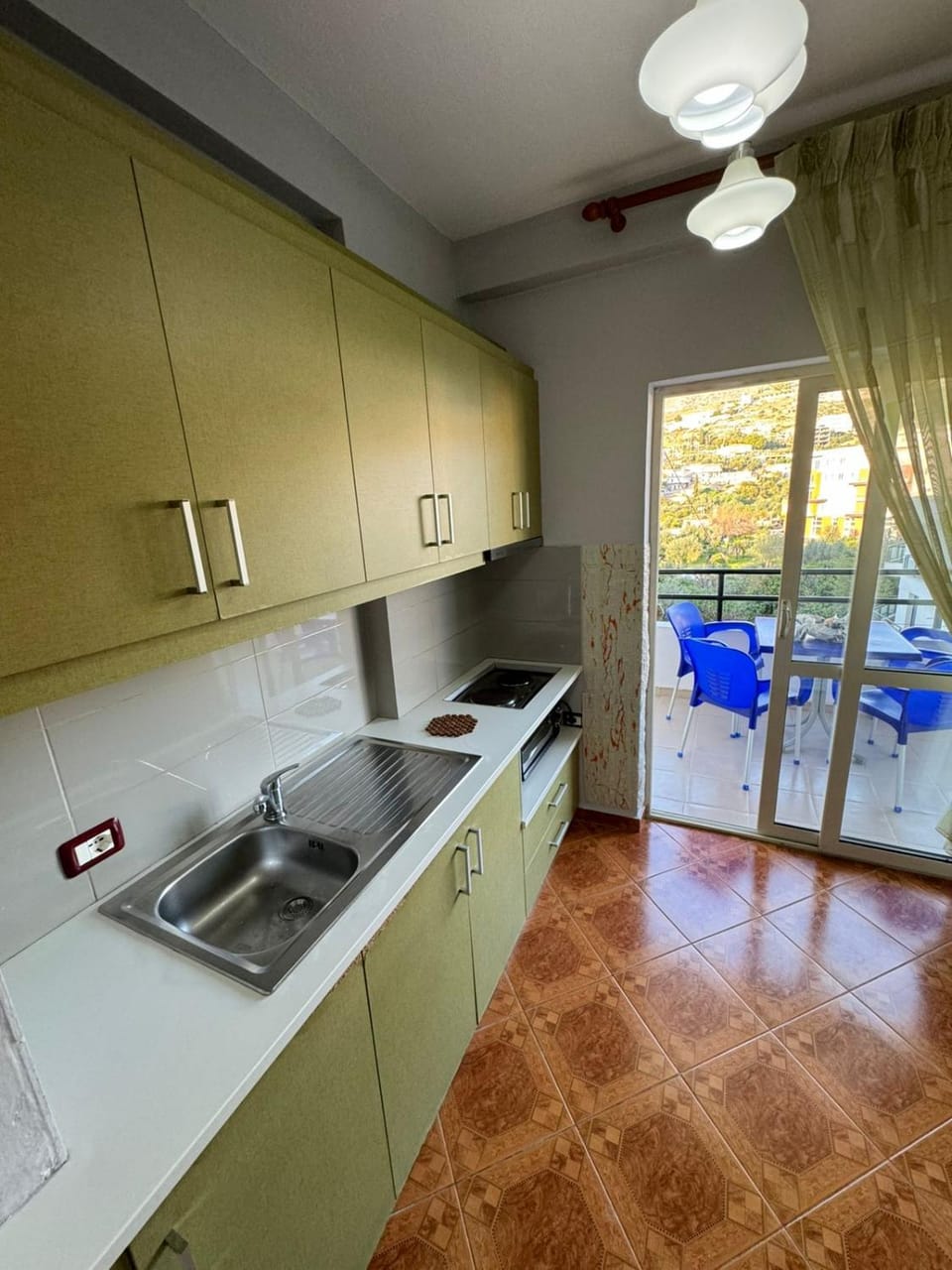 Kitchen or kitchenette, stove