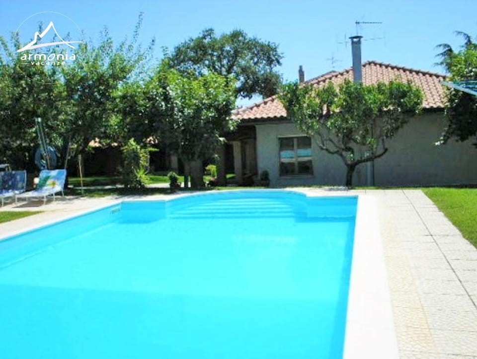 Property building, Day, Pool view, sunbed