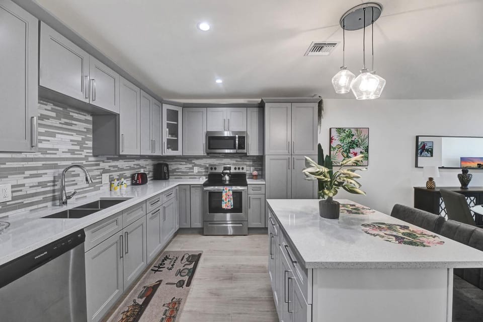 Kitchen or kitchenette, dishwasher, oven, stove, toaster