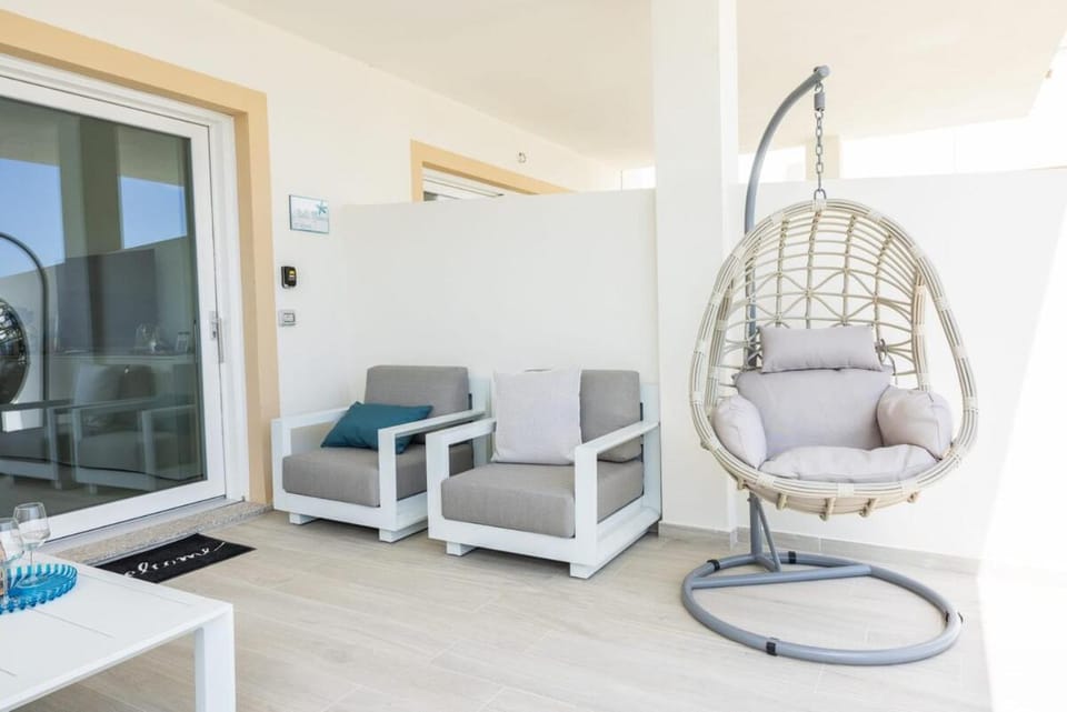 Patio, Living room, Seating area, sunbed