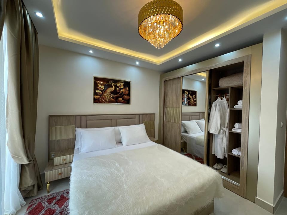 Bed, Photo of the whole room, Bedroom, towels, wardrobe