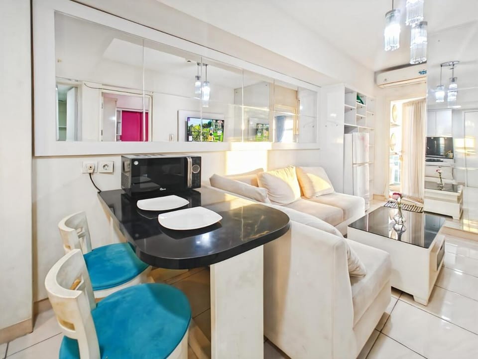 Cozy 2BR Springlake Apt Bekasi with Pool & Gym by 2ndHome Apartment in West Java