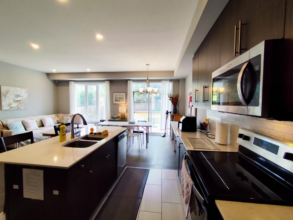 Living room, Seating area, Dining area, dishwasher, oven, stove