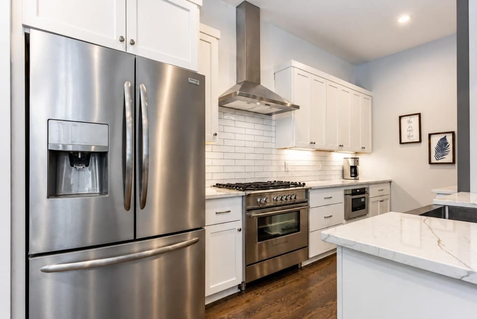 Kitchen or kitchenette, dishwasher, oven, stove, toaster