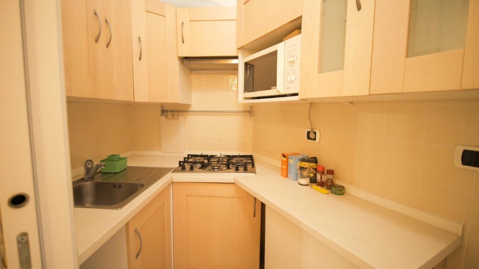 Kitchen or kitchenette, stove
