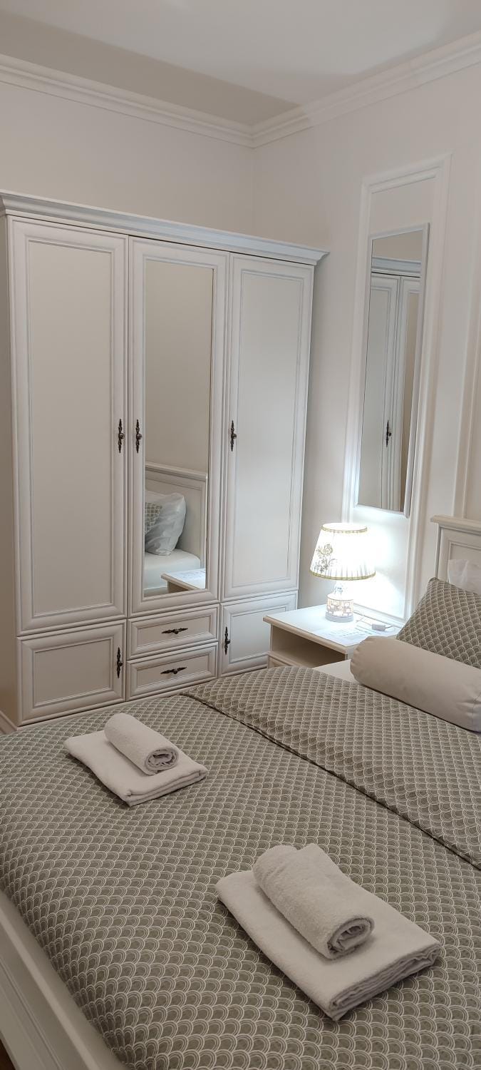 Bed, Bedroom, towels, wardrobe