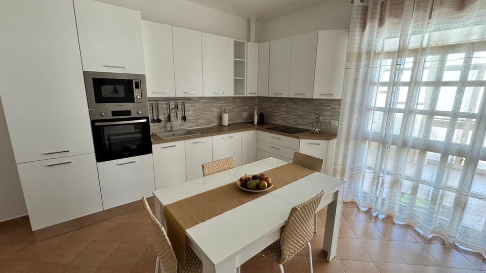 Kitchen or kitchenette, Dining area, dishwasher, oven, stove