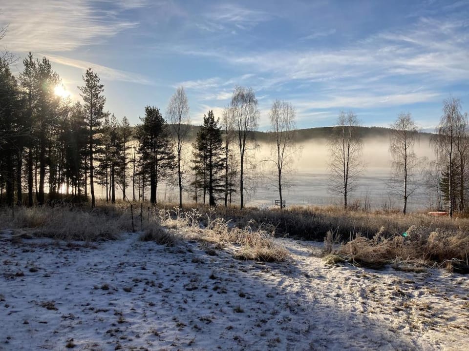 Traditional wooden house at the lake Chalet in Norrbotten County, Sweden