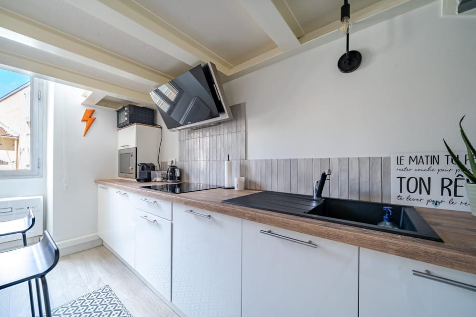 Kitchen or kitchenette, dishwasher, oven, stove
