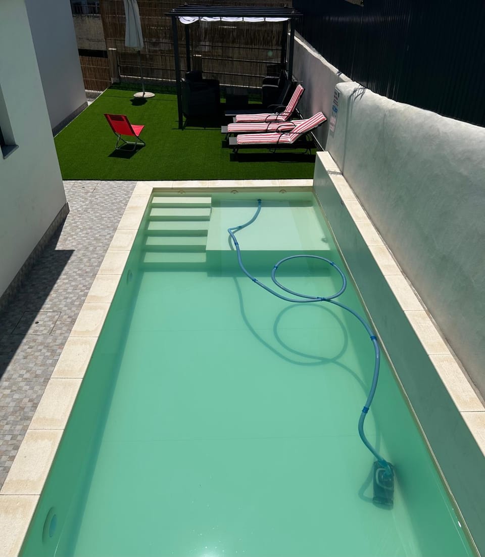 Swimming pool, sunbed