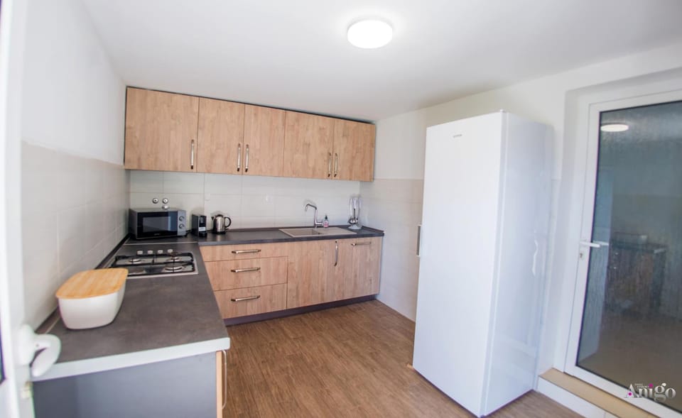 Kitchen or kitchenette, oven, stove