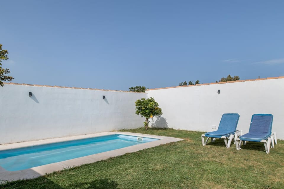 Property building, Living room, Swimming pool
