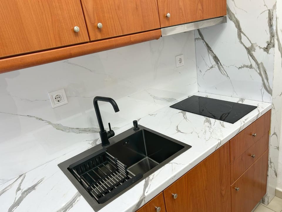 Kitchen or kitchenette, stove