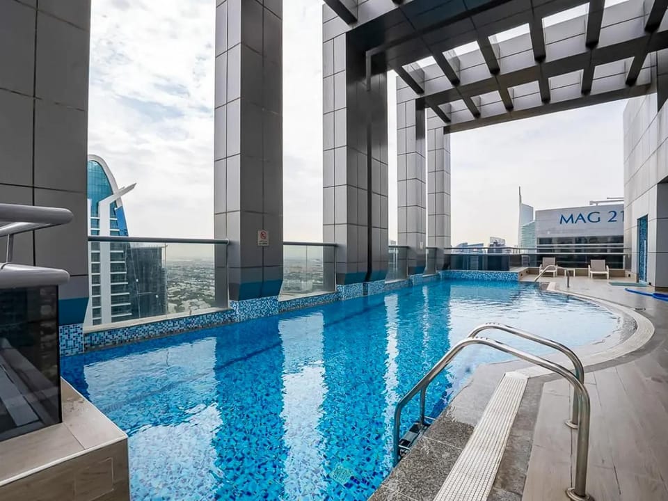 1BR Gem with Lake and Sea View Plus Pool and Gym Access Apartment in Dubai